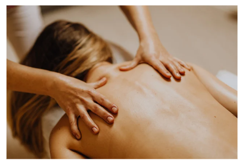 Woman receiving intentional massage therapy